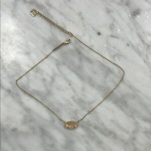 Elegant Gold Necklace with Pink Stone
